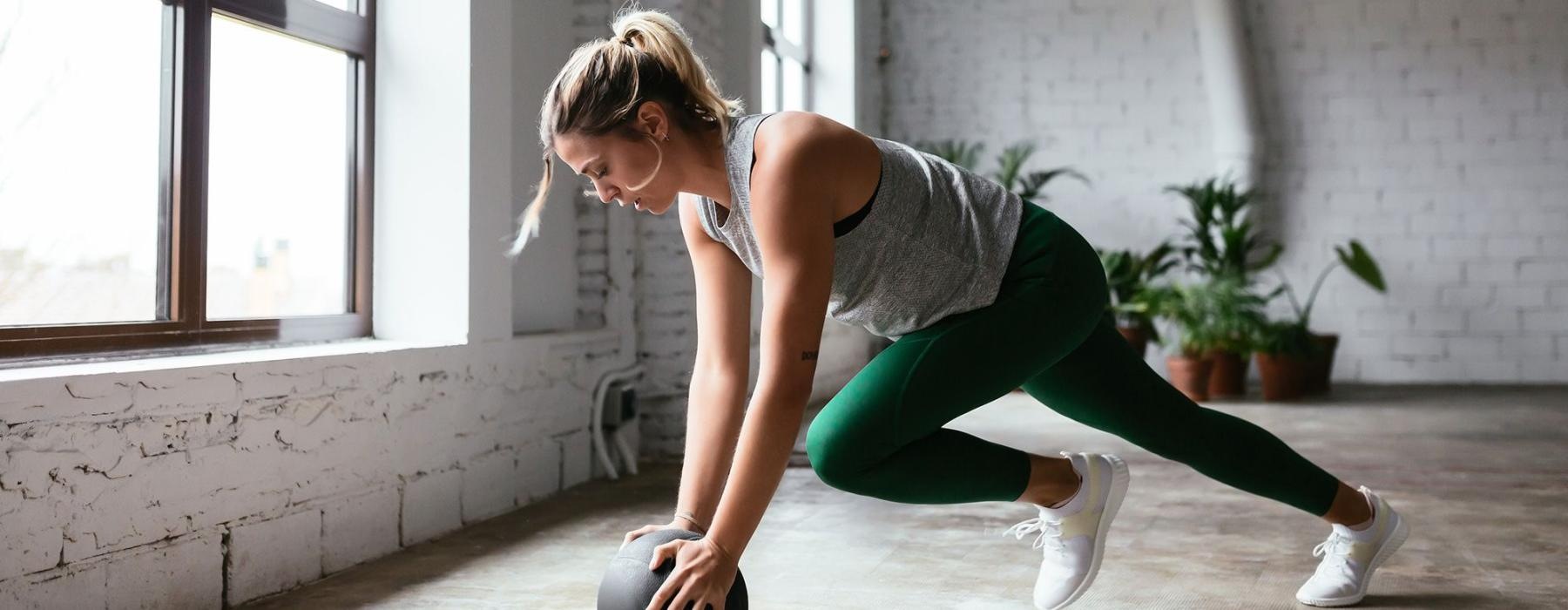 a person working out with a ball