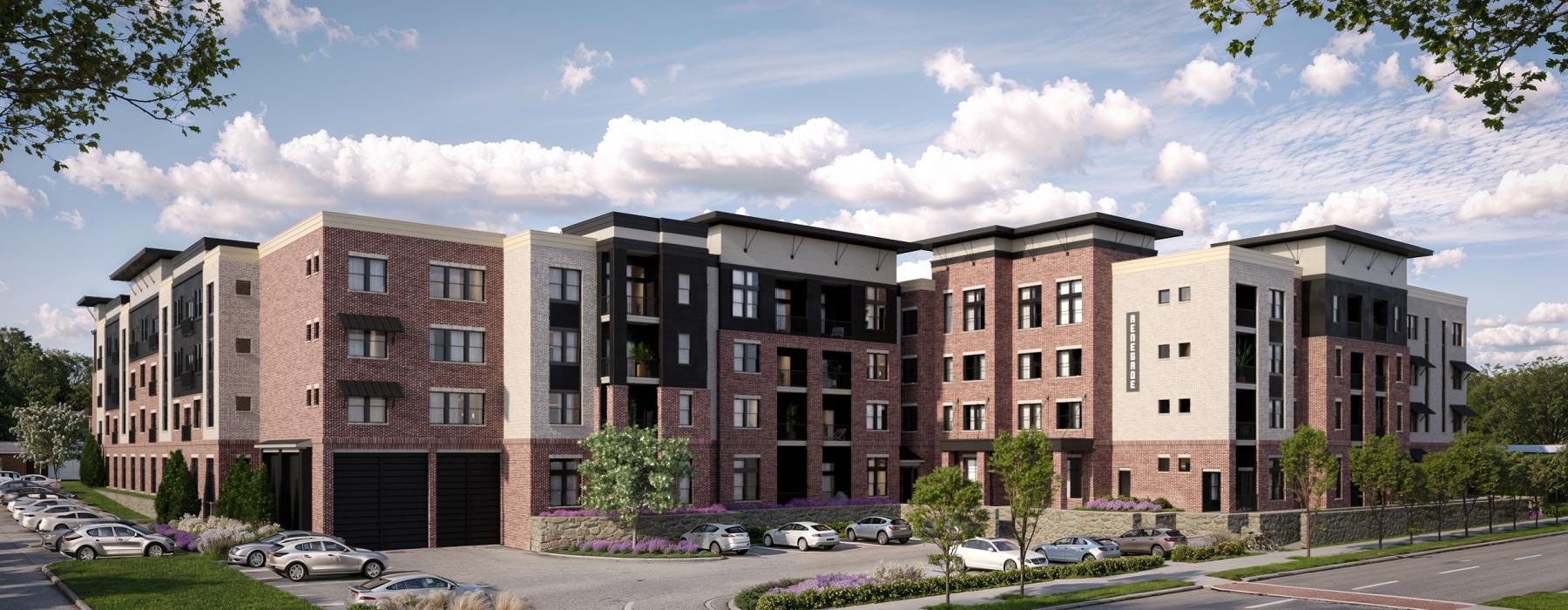 a building with cars parked in front